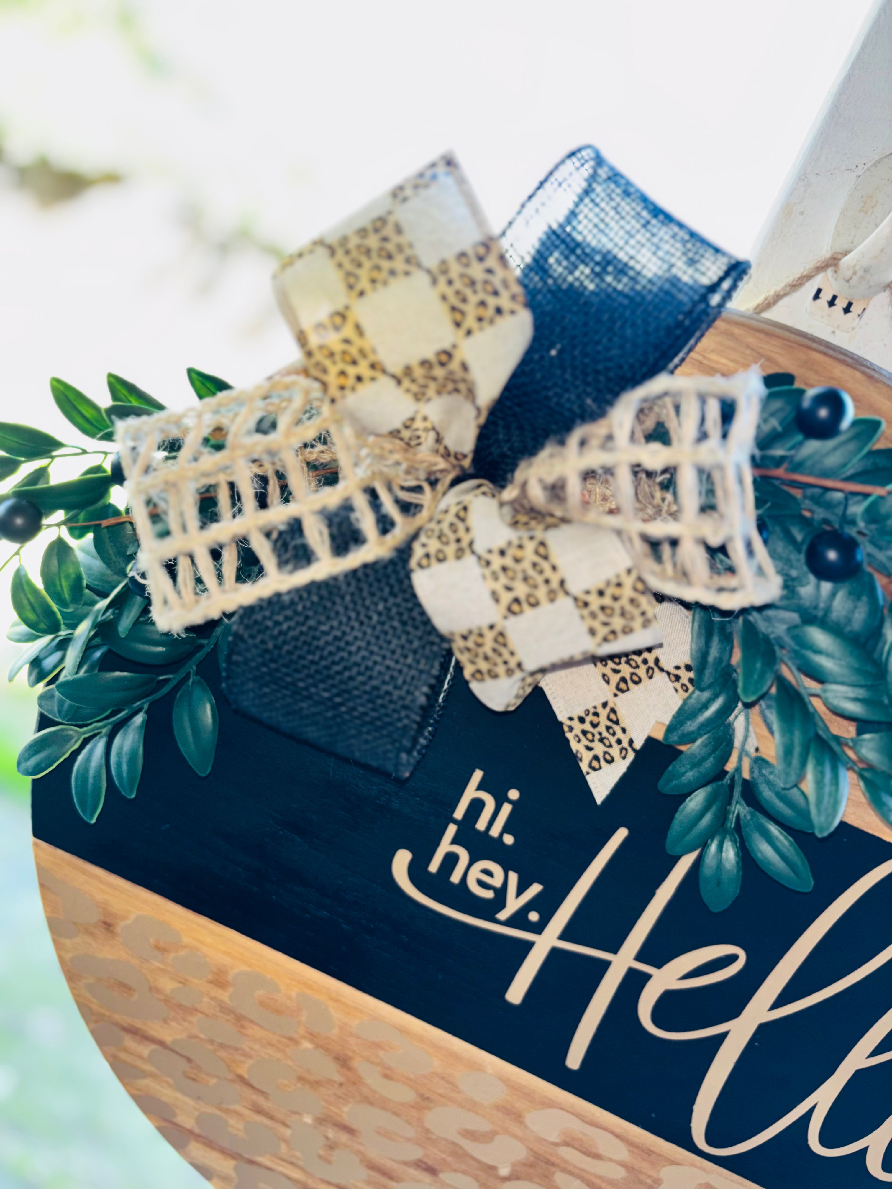 Hi, hey, hello leopard print door hanger